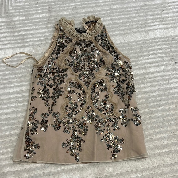 Elie Tahari Tops - Blouse with iridescent sequence